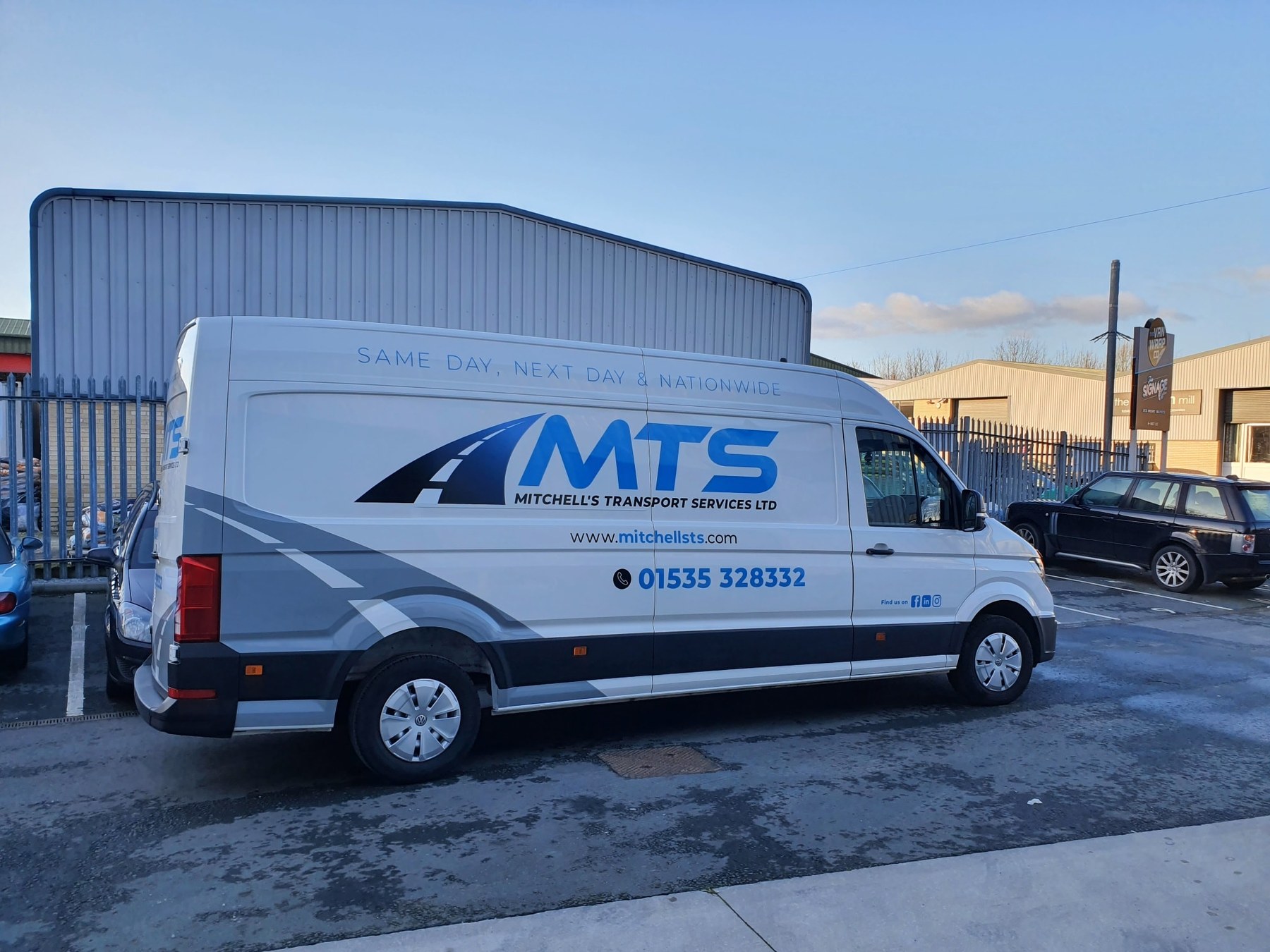 MTS van outside a building